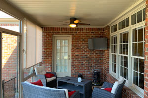 Converted our 4-season porch from can lights to two ceiling fans.