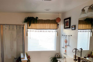 We wanted a decorative pendant to replace the can light above the tub.