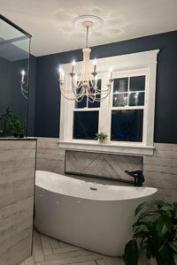 Chandelier above bathtub