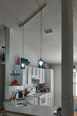 Recessed light after using The Can Converter, model R56-RMF-WHT recessed light kit http://Now%20the%20sink%20and%20adjacent%20work%20area%20are%20much%20brighter.