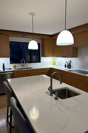 Recessed light after using The Can Converter, model R56-RMF-WHT recessed light kit http://Lights%20over%20kitchen%20island%20to%20pendant%20lights.