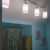 Track lighting over bathroom vanity.